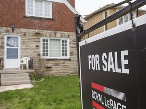 National homes sales declined 0.7 per cent in October from a month earlier, the Canadian Real Estate Association reported Monday.