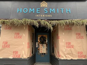 A storefront on Roncesvalles Avenue displays a "for lease" sign as part of a protest against the Ontario government's pandemic lockdown rules in Toronto, on Tuesday Nov. 24, 2020.