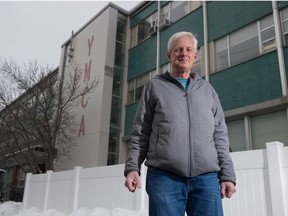 Bill Bolstad, who has been a YMCA of Regina member for more than 30 years, stands in front of the YMCA's downtown location in Regina, Saskatchewan on Nov. 17, 2020.