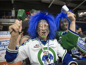The staunch support for the Swift Current Broncos, who are located in the WHL's smallest market, was evident at the 2018 Memorial Cup in Regina. Broncos fans Ray McGregor, left, and Preston Lord are shown cheering on the 2017-18 WHL champions at the Brandt Centre.