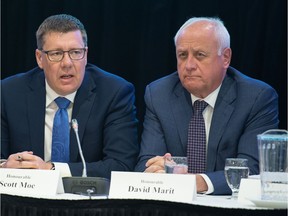 Provincial agriculture minister David Marit, right, flanks Saskatchewan Premier Scott Moe during the bear-pit session at the Municipalities of Saskatchewan (MOS) conference held at the Queensbury Convention Centre in Regina, Saskatchewan on Feb. 5, 2020. BRANDON HARDER/ Regina Leader-Post