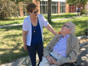 Pamela Cowan and her dad Ian during a visit outside Wascana Rehabilitation Centre in summer 2020.
Image courtesy Pamela Cowan.