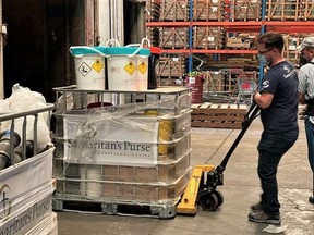 Regina resident David Whitrow moves relief supplies for Samaritan's Purse in a warehouse in Honduras after hurricanes Eta and Iota ravaged the country in November, 2020.