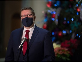 Saskatchewan Premier Scott Moe at a pre-Christmas scrum in legislature's rotunda.