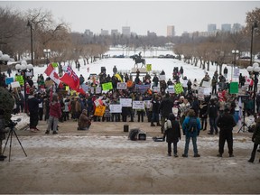 Participants listen to speakers during an event billed as the Saskatchewan Freedom Rally held at the Saskatchewan Legislative Building in Regina, Saskatchewan on Dec. 12, 2020.