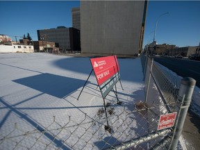 A for sale sign stands in the lot that was, for many years, the Capital Pointe hole on the corner of Victoria Avenue and Albert Street in Regina, Saskatchewan on Dec. 16, 2020. After a Wednesday council meeting progress at the lot is still pending.