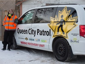 Patty Will, founder of Queen City Patrol, stands with one of the new vehicles that was donated to the needle pickup organization in Regina, Saskatchewan on Dec. 18, 2020.