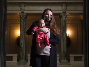 REGINA, SASK : December 23, 2020  --  NDP MLA Aleana Young stands holding her baby Hara in the Saskatchewan Legislative Building in Regina, Saskatchewan on Dec. 23, 2020.

BRANDON HARDER/ Regina Leader-Post