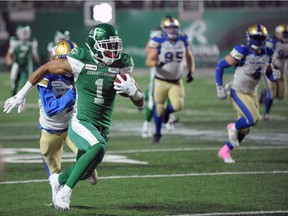 Saskatchewan Roughriders receiver Shaq Evans, 1, shown en route to the end zone in 2019, has signed a new contract with the CFL team.