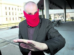 Convicted pedophile Graham James is seen arriving at a 2012 sentencing hearing in Winnipeg. James served a total of 10 1/2 years in prison for sexually abusing five hockey players who he once coached.