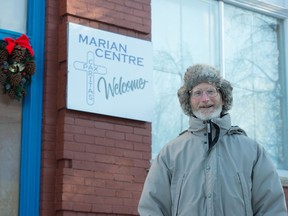 Charlie Kavanaugh, director of the Marian Centre, stands by the centre on Halifax Street in Regina, Saskatchewan on Dec. 18, 2020. The Marian Centre's annual Christmas dinner will be served as take-out this year.