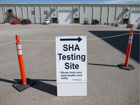 A sign marks the entry at the Saskatchewan Health Authority drive-thru COVID-19 testing facility in Regina.