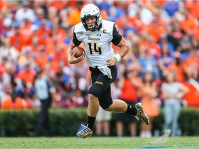 The ranks of the Saskatchewan Roughriders' quarterbacks swelled to six with the recent signing of Tom Flacco, shown in 2019 with the Towson Tigers. He is the younger brother of veteran NFL pivot Joe Flacco.