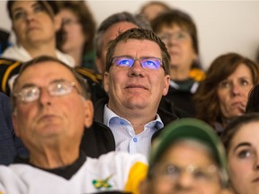Saskatchewan Premier Scott Moe looks on at an April 14, 2018 SJHL playoff game between the Nipawin Hawks and the visiting Estevan Bruins. The provincial government announced Friday that the SJHL and the five Saskatchewan-based WHL teams will receive financial assistance that is designed to help them weather COVID-induced economic challenges.