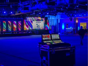 Workers watch prepared Juno Awards Gala projections at Prairieland Park, which was suppose to host the Juno Awards Gala but was cancelled due to COVID-19, in Saskatoon, SK on Thursday, March 12, 2020.