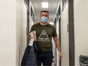 Intensive care specialist Dr. Hassan Masri arrives at Merlis Belsher Arena to become the third person in Saskatoon to receive the Pfizer Covid-19 vaccine. Photo taken in Saskatoon, SK on Tuesday, Dec. 22, 2020.