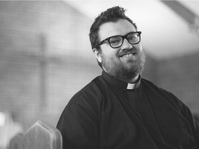 Catholic parish priest Father Parker Love sits in the St. Augustine church in Wilcox, Saskatchewan on July 16, 2020.