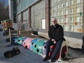 Steve Compton, CEO of Regina YMCA, sits in the outside daycare area at the downtown YMCA.