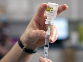A dose of COVID-19 vaccine is prepared for administration on Thursday, Jan.7 in Prince Albert, Saskatchewan.