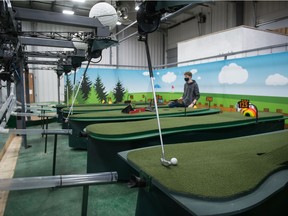 OneShot Golf greens are seen at 54e Dev Studios in Regina, Saskatchewan on Jan. 27, 2021. The online robot golf game is now being offered to the public.
