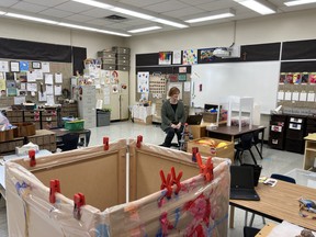 Lee-an Schoff, a pre-kindergarten and kindergarten teacher at Holy Rosary Community School, sits alone in her classroom while teaching her students using Microsoft Teams. Regina students returned to their studies on Jan. 4 with a week of online learning and will return to in-person learning on Jan. 11. (Photo courtesy of Twylla West)