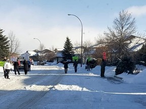 Anti-mask protest in front of the family home of Saskatchewan chief medical health officer Dr. Saqib Shahab in a photo they brazenly posted online.