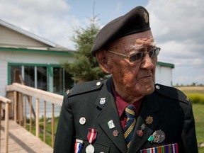 Philip Favel stands in front of his home on the Sweetgrass First Nation. Favel is one of Saskatchewan's few remaining Indigenous veterans of the Second World War. Photo by Zehra Rizvi.