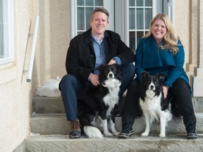 Football broadcast personality Derek Taylor, left, and his wife Fiona Odlum, a weather expert for CBC, sit with their dogs Ruby, left and Lewi at their home in Emerald Park.
BRANDON HARDER/ Regina Leader-Post