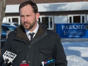 Saskatchewan NDP leader Ryan Meili speaks about the state of private care homes during a news conference in front of Extendicare Parkside in Regina, Saskatchewan on Feb. 2, 2021.