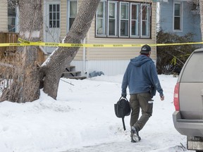 Police work at the scene of a death investigation on the 1000 block of Garnet Street in Regina, Saskatchewan on Feb. 21, 2021.

BRANDON HARDER/ Regina Leader-Post