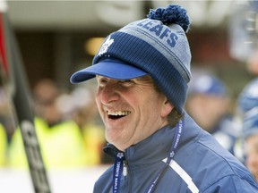 In this Feb. 7, 2019, file photo, Toronto Maple Leafs coach Mike Babcock smiles during NHL hockey practice in Toronto. Babcock, who coached the Detroit Red Wings to a Stanley Cup title and the Canadian men's team to two Olympic medals, is taking over the University of Saskatchewan Huskies men's team. (Frank Gunn/The Canadian Press via AP)