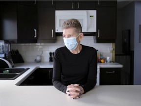 CP-Web. Beverley Hartnell poses for a photo at her home in Regina on Saturday Jan. 30, 2021. Hartnell's 88-year-old father Bernard died of COVID-19 on Jan. 11.