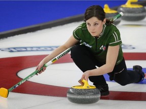 Team Saskatchewan lead Breanne Knapp makes a shot at the Scotties Tournament of Hearts in Calgary on Saturday.