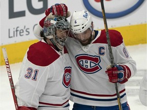 Montreal Canadiens defenceman Shea Weber, right, celebrates with goaltender Carey Price after Saturday's 2-1 victory over the host Toronto Maple Leafs.