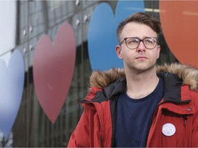 Kent Peterson, spokesperson for Queen City For All, poses for a photo outside of City Hall. The group wants city council to follow Saskatoon's lead and ban conversion therapy in the city.
