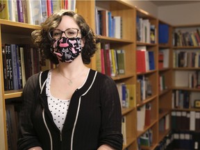 Yolanda Hansen, program manager for the Saskatchewan Writers' Guild, poses in the group's library. The guild will launch Talking Fresh, a six-day online event featuring numerous Canadian writers, from March 2 to 7. (Michael Bell / Regina Leader-Post)