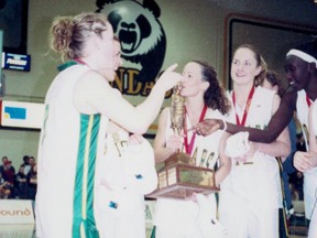 Crystal McGregor kisses the Bronze Baby on March 11, 2001 in Edmonton after helping the University of Regina Cougars win the Canadian university women's basketball championship.