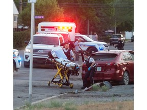 Police and paramedics respond to the scene of an incident on 5th Avenue East between McDonald Street and Lindsay Street on June 11, 2019. The single-vehicle crash gave way to a homicide investigation into the death of Denny Jimmy.