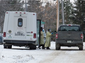 INDIAN HEAD, SASK : November 20, 2020  -- Workers approach a pickup truck at a mobile COVID-19 testing station in Indian Head, Saskatchewan on Nov. 20, 2020.

BRANDON HARDER/ Regina Leader-Post