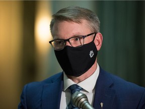 Saskatchewan Rural and Remote Health Minister Everett Hindley is seen during a media scrum in the Rotunda at the Saskatchewan Legislative Building.