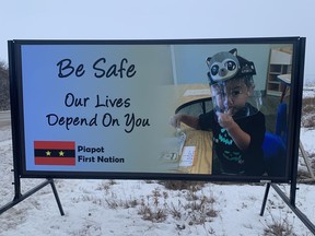 One of four double-sided photo billboards at the Piapot First Nation, north of Regina, Sask., promotes COVID-19 safety measures using local members as photo models. The signs went up in mid-January, 2021. Submitted Photo