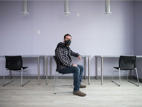 Michael Parker, executive director of Newo Yotina Friendship Centre, sits in an overdose prevention site being constructed following a news conference held at the centre on March 5, 2021.