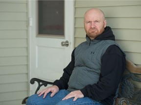 Peter Nokonechny, a former client of Pine Lodge Treatment Centre, sits outside a home in Regina, Saskatchewan on Mar. 11, 2021.