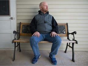 Peter Nokonechny, a former client of Pine Lodge Treatment Centre, sits outside a home in Regina, Saskatchewan on Mar. 11, 2021. BRANDON HARDER/ Regina Leader-Post