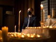 BESTPHOTO SASKATOON, SK-- March 15/2021 - 0318 news cover yearend funerals - Funeral director Morgan Edwards is photographed with hundreds of candles at the Saskatoon Funeral Home, which symbolize the lives lost in Saskatchewan due to the COVID-19 pandemic. Photo taken in Saskatoon on Monday, March 15, 2021.