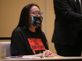 Debbie Baptiste, Colten Boushie's mother, sits at a news conference to address the finding of racial discrimination at the Saskatchewan RCMP on March 22, 2021.