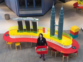 Sandy Baumgartner, CEO of the Saskatchewan Science Centre, stands in front of a display of model LEGO buildings at their latest exhibit, Towers of Tomorrow. The opening of the exhibit had to be postponed due to the coming lockdown. Mar. 25, 2021.