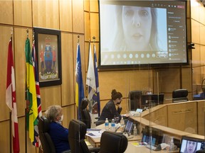 Cpl. Jacy Windjack of the Regina Police Service, shown on screen at top right of frame, speaks remotely to the Regina Board of Police Commissioners meeting held at City Hall in Regina, Saskatchewan on March 30, 2021.