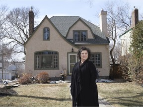 Jackie Schmidt, president of Heritage Regina, poses for a photo in Cathedral Neighbourhood.