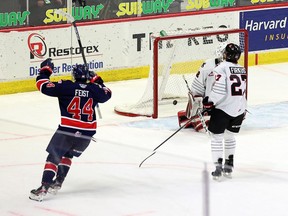 Regina Pats' Layton Feist (44) celebrates his overtime goal versus the Moose Jaw Warriors on March 30, 2021 at the Brandt Centre. Keith Hershmiller Photography.